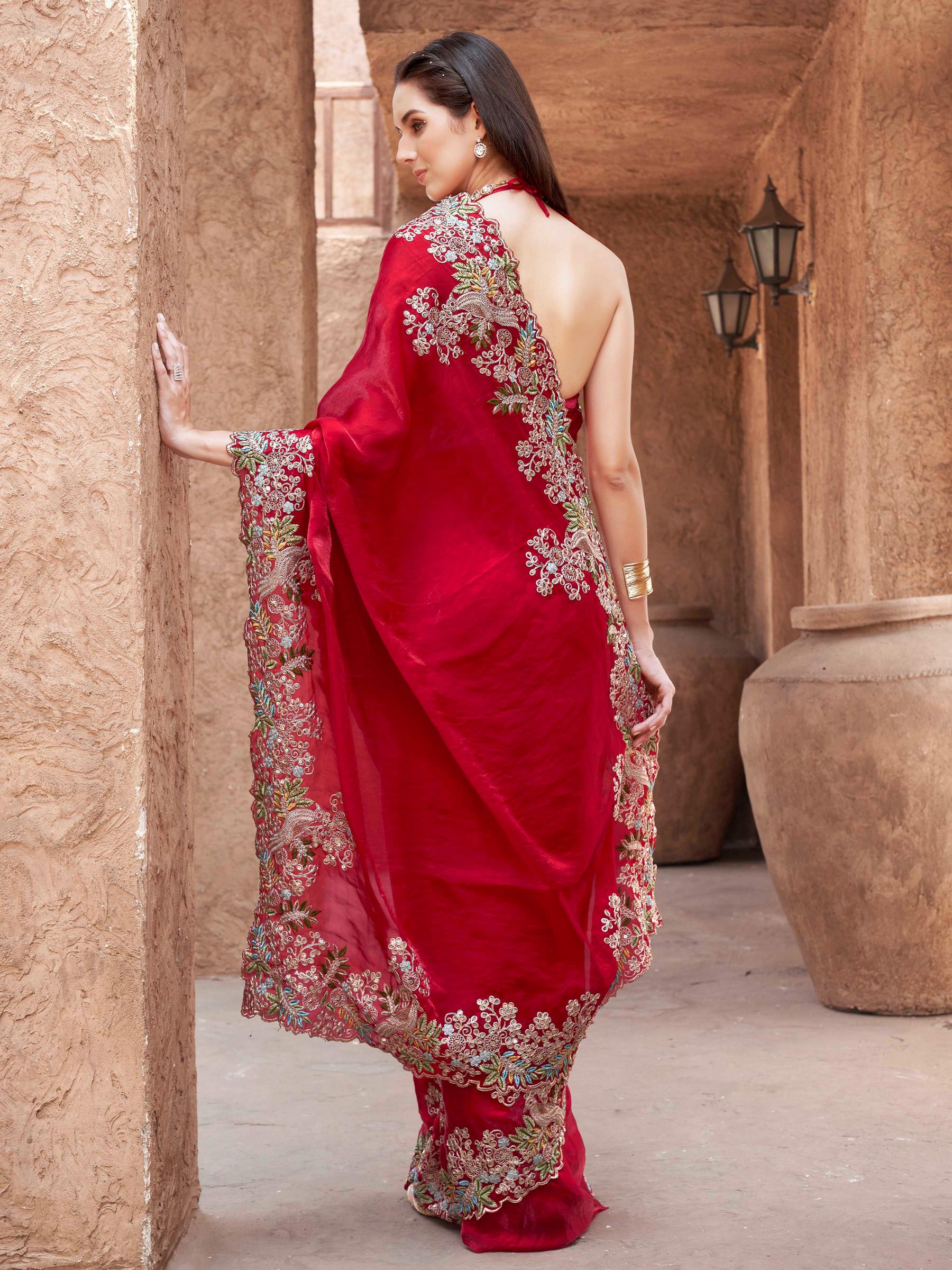 red colored designer jimmy choo saree with sequinned embroidery border